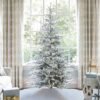 8' King Noble Flock Artificial Christmas Tree with 600 Warm White LED Lights
